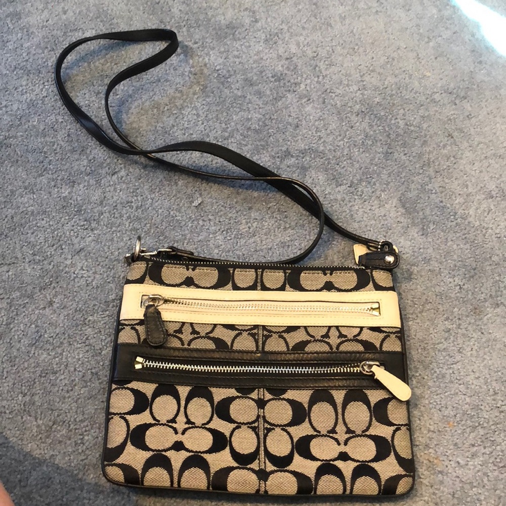 Coach crossbody small bag.  Black coach logos